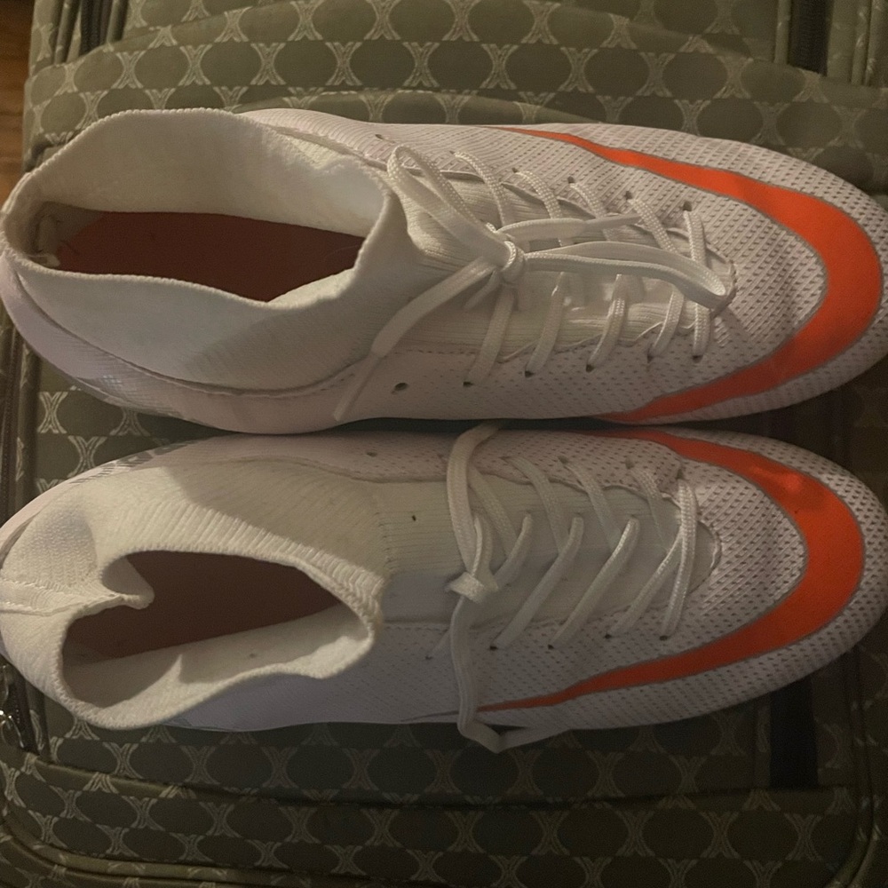 White and Orange Athletic Shoes